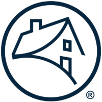 Logo of a house within a circular border, featuring a stylized design.
